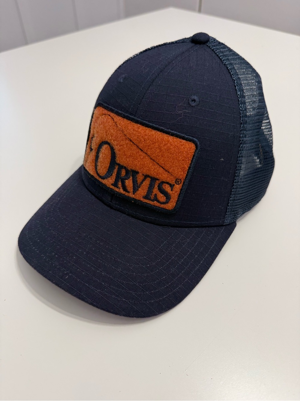 Orvis Navy Cap with Rust Patch